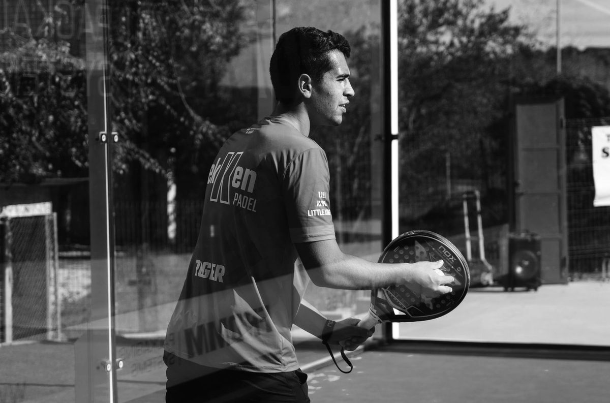 A player striking the ball outdoors